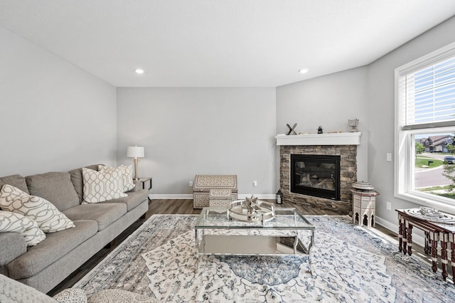 6674 Annabelle Ct, Corcoran, MN 55340 - living room featuring wood finished floors, a fireplace, baseboards, and recessed lighting