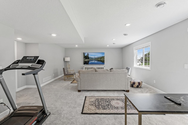 6674 Annabelle Ct, Corcoran, MN 55340 - carpeted living room with recessed lighting, baseboards, and a textured ceiling