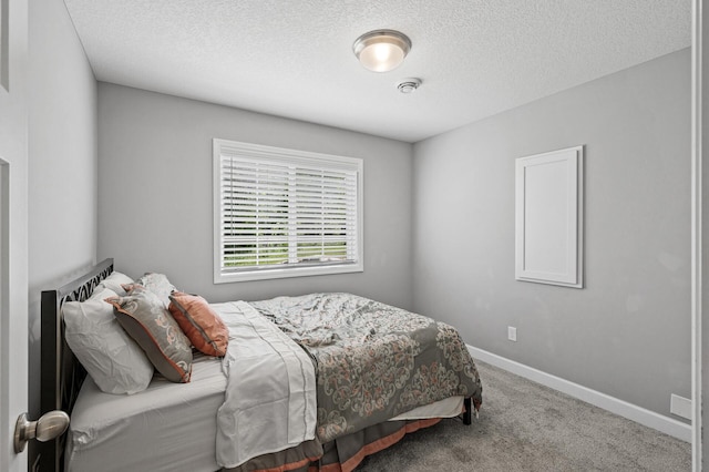 6674 Annabelle Ct, Corcoran, MN 55340 - carpeted bedroom featuring a textured ceiling and baseboards