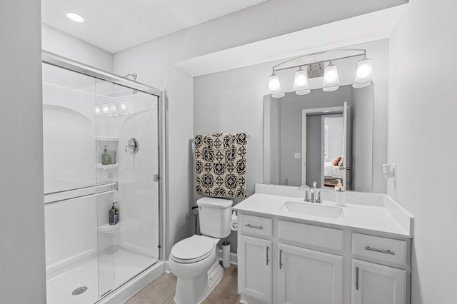 6674 Annabelle Ct, Corcoran, MN 55340 - bathroom with toilet, a stall shower, and vanity