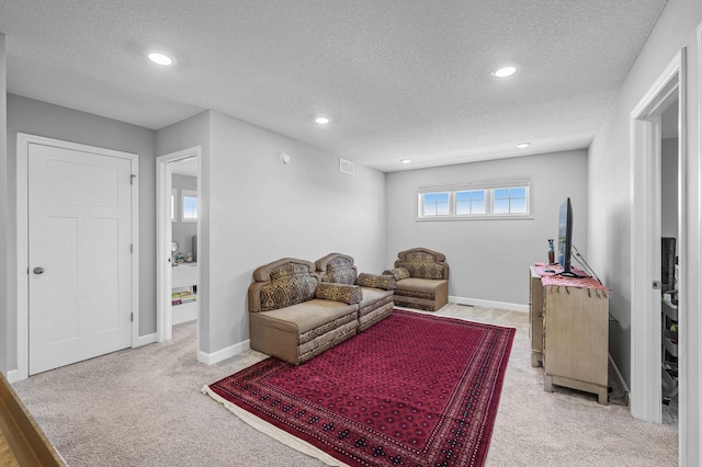 6674 Annabelle Ct, Corcoran, MN 55340 - sitting room featuring light carpet, a textured ceiling, recessed lighting, and baseboards