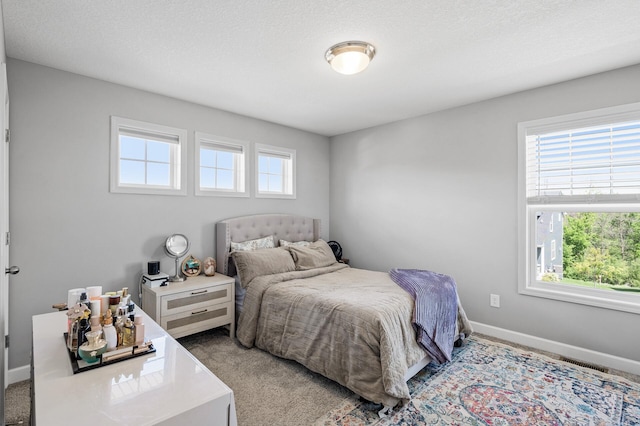 6674 Annabelle Ct, Corcoran, MN 55340 - carpeted bedroom featuring multiple windows and baseboards