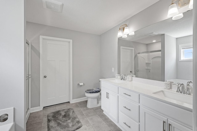 6674 Annabelle Ct, Corcoran, MN 55340 - bathroom featuring a shower stall, toilet, double vanity, and baseboards