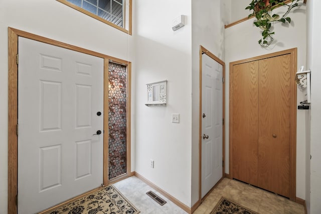 8366 Parkview Ave NE, Otsego, MN 55330 - entrance foyer featuring baseboards and a high ceiling