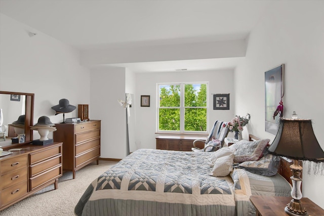 bedroom with light carpet