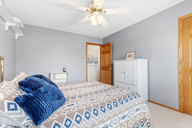 bedroom with carpet floors, baseboards, and a ceiling fan