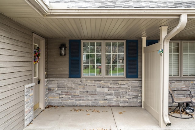 553 Cedar Ct, Taylors Falls, MN 55084 - entrance to property featuring stone siding and a porch