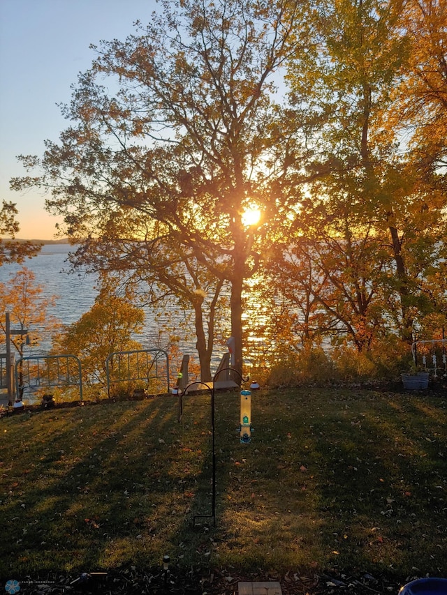 42871 Lida View Ln, Lida Twp, MN 56587 - yard at dusk with a water view and a lawn