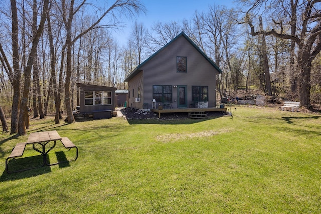 9688 Walleye Rd NW, Brandon Twp, MN 56315 - rear view of property with a lawn and a deck