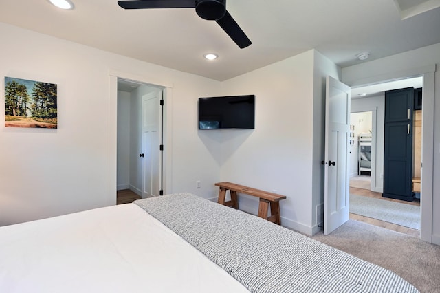 1011 Burgs Park Dr, Shell Lake, WI 54871 - bedroom featuring light carpet, baseboards, recessed lighting, and ceiling fan
