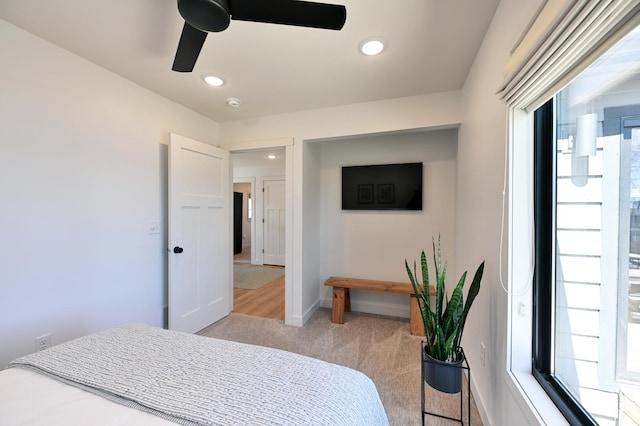 1011 Burgs Park Dr, Shell Lake, WI 54871 - bedroom featuring baseboards, recessed lighting, light colored carpet, and multiple windows