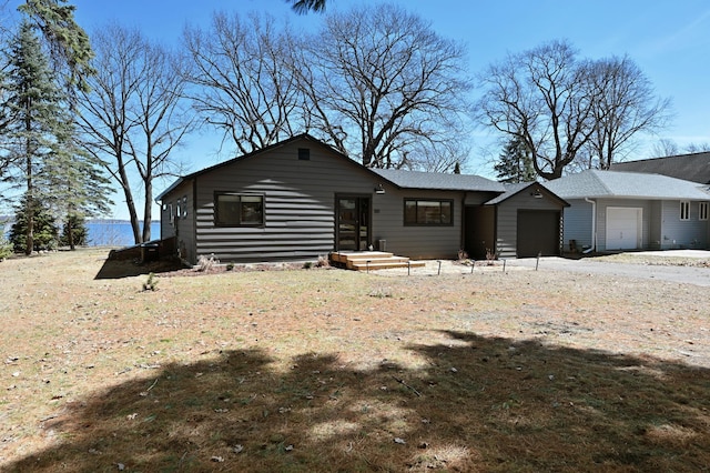 1011 Burgs Park Dr, Shell Lake, WI 54871 - view of front of house featuring a garage