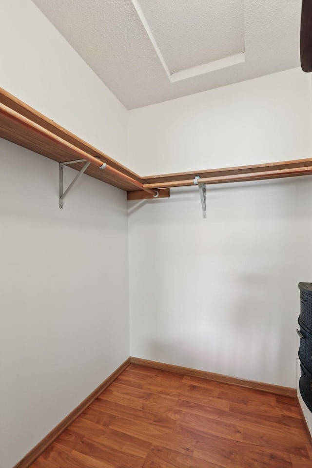 8397 Corcoran Cir Unit 26, Inver Grove Heights, MN 55076 - spacious closet featuring wood finished floors