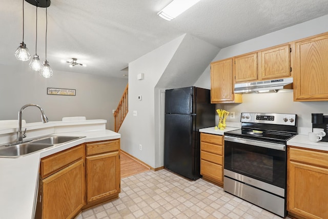 8397 Corcoran Cir Unit 26, Inver Grove Heights, MN 55076 - kitchen featuring under cabinet range hood, stainless steel range with electric cooktop, a sink, freestanding refrigerator, and light floors