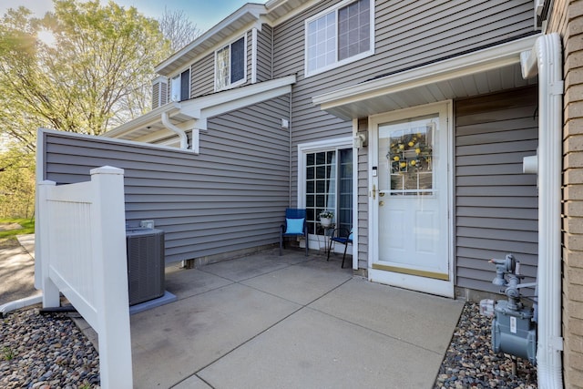 8397 Corcoran Cir Unit 26, Inver Grove Heights, MN 55076 - doorway to property featuring a patio and cooling unit