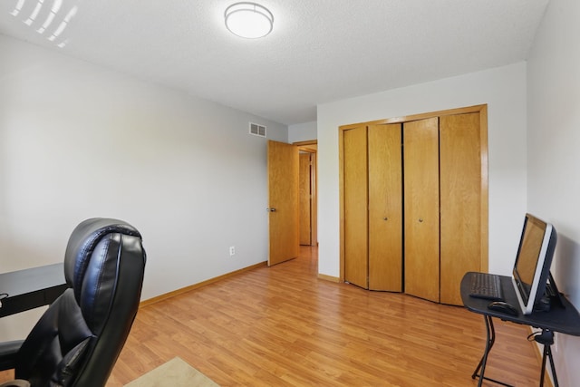 8397 Corcoran Cir Unit 26, Inver Grove Heights, MN 55076 - office area featuring light wood-type flooring and baseboards