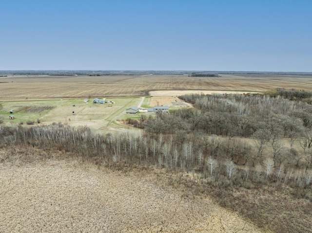 birds eye view of property featuring a rural view
