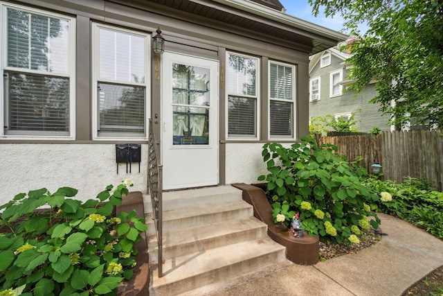 3304 Longfellow Ave, Minneapolis, MN 55407 - view of exterior entry with fence and stucco siding