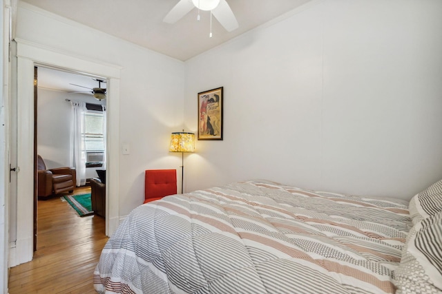 3304 Longfellow Ave, Minneapolis, MN 55407 - bedroom featuring ceiling fan and light wood-style flooring