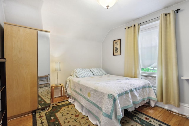 3304 Longfellow Ave, Minneapolis, MN 55407 - bedroom featuring lofted ceiling and hardwood / wood-style flooring