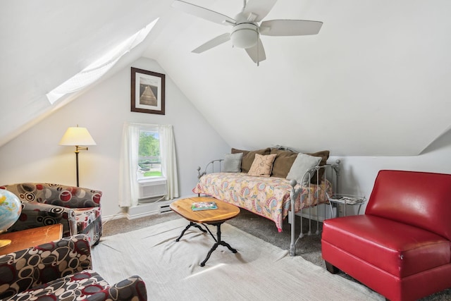 3304 Longfellow Ave, Minneapolis, MN 55407 - interior space featuring baseboards, a ceiling fan, vaulted ceiling with skylight, and carpet