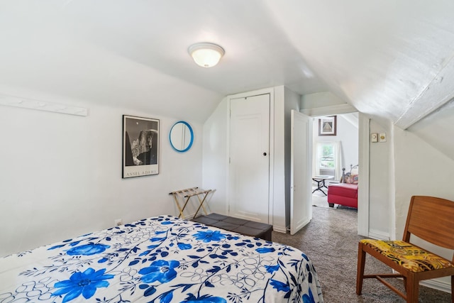 3304 Longfellow Ave, Minneapolis, MN 55407 - bedroom with vaulted ceiling, carpet, and baseboards