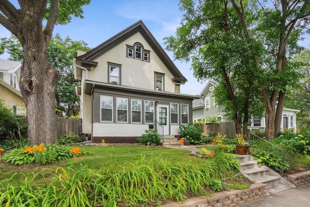 3304 Longfellow Ave, Minneapolis, MN 55407 - view of front facade with stucco siding, entry steps, and fence