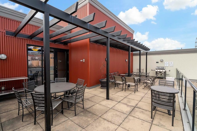 240 Spring St Unit 413, Saint Paul, MN 55102 - view of patio featuring outdoor dining space and a pergola