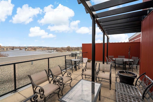 240 Spring St Unit 413, Saint Paul, MN 55102 - balcony featuring outdoor dining area, a water view, and a pergola