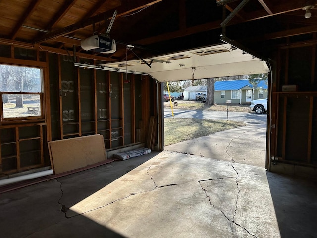 garage featuring a garage door opener