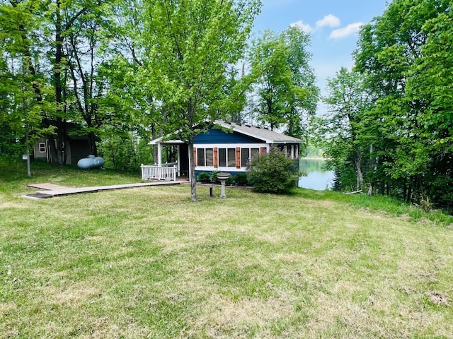 41820 Bald Eagle Dr, Marcell Twp, MN 56628 - view of green lawn featuring a water view