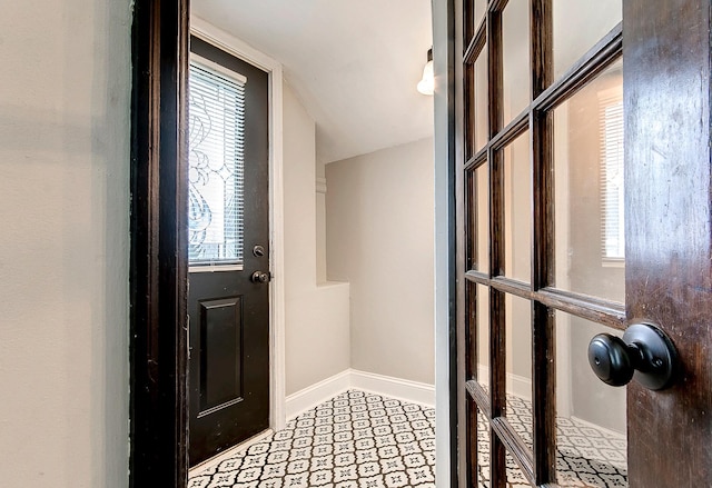 423 1st St NW, Faribault, MN 55021 - doorway featuring baseboards