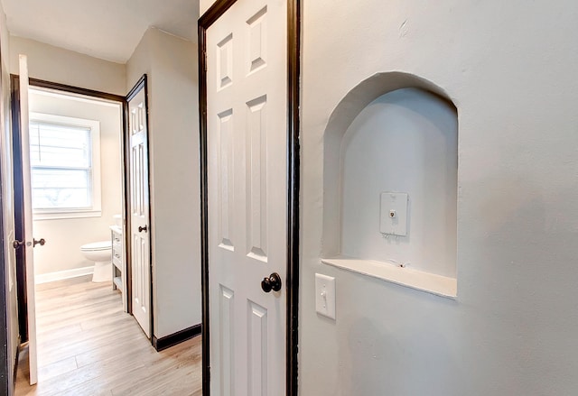 423 1st St NW, Faribault, MN 55021 - hallway featuring light wood finished floors