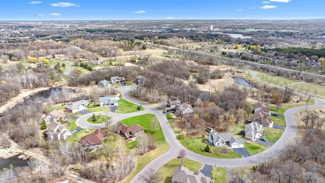 19390 Queen Cir NW, Elk River, MN 55330 - aerial view of property's location featuring nearby suburban area and a large body of water
