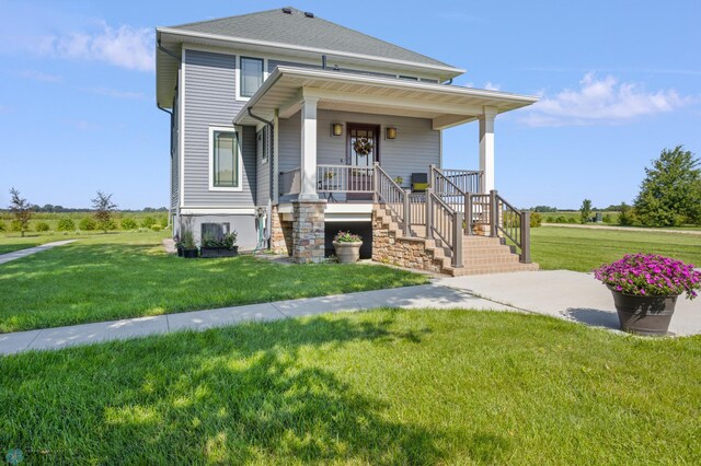 9730 177th Ave SE, Fairmount, ND 58030 - view of front of house with a front lawn and a porch