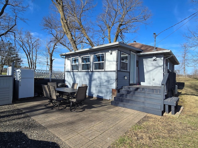 50967 Wymer Lake Trl, Hobart Twp, MN 56544 - view of front facade with a patio area
