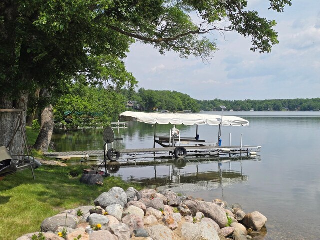 50967 Wymer Lake Trl, Hobart Twp, MN 56544 - dock featuring a water view and boat lift