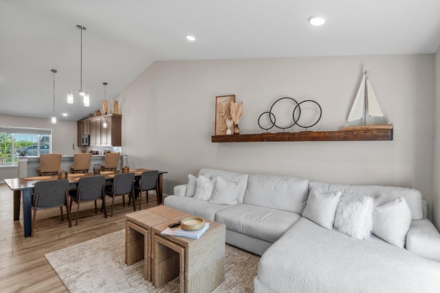 5928 Th St W, Lakeville, MN 55044 - living area with light wood finished floors, lofted ceiling, and recessed lighting