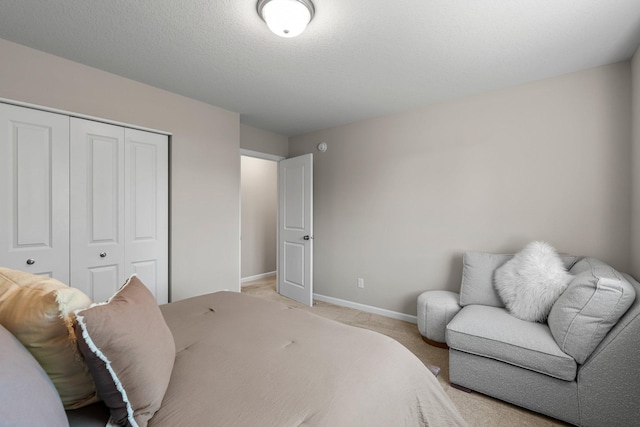 5928 Th St W, Lakeville, MN 55044 - bedroom with a closet, baseboards, and light carpet