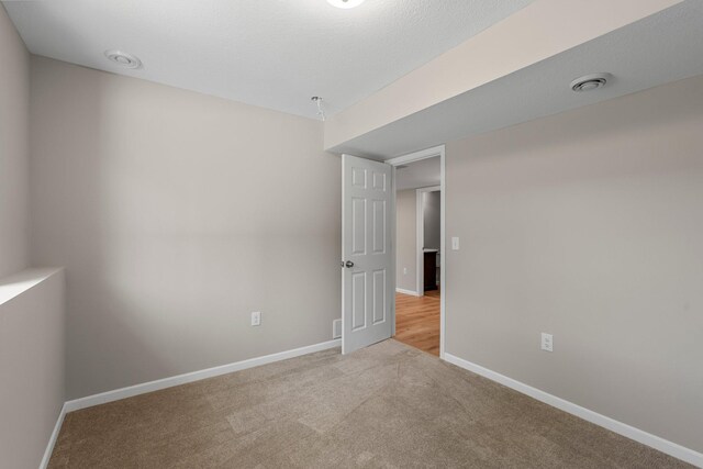 5928 Th St W, Lakeville, MN 55044 - unfurnished room with light carpet and baseboards