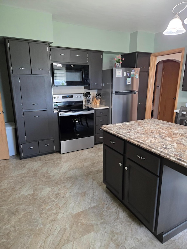 218 Lake Ave E, Fulda, MN 56131 - kitchen with stainless steel appliances and light stone counters