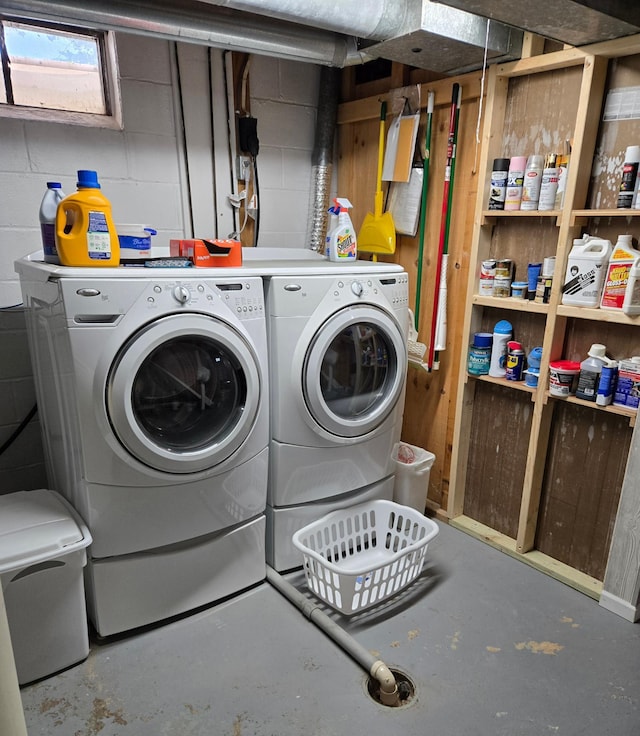 218 Lake Ave E, Fulda, MN 56131 - laundry room featuring washing machine and dryer and concrete block wall