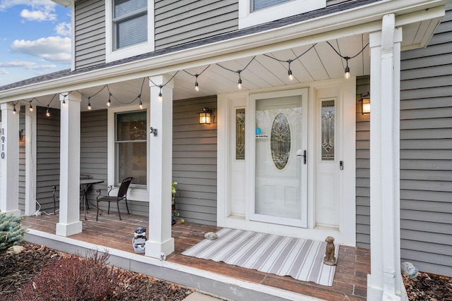 doorway to property with a porch