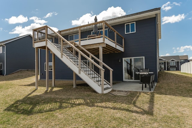 back of house with a yard, stairs, a deck, and a patio