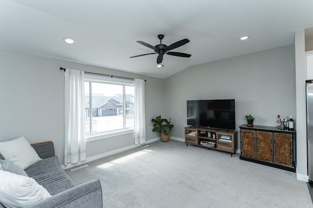 carpeted living area with ceiling fan, baseboards, vaulted ceiling, and recessed lighting