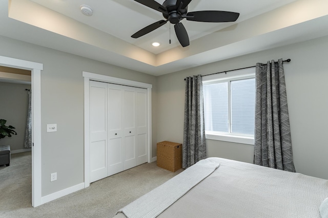 bedroom with baseboards, a closet, carpet flooring, and recessed lighting