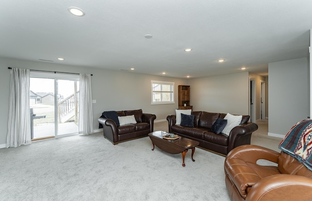 carpeted living room with baseboards and recessed lighting