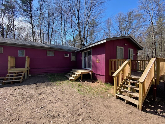 W8108 Vernon Ave, Chicog Twp, WI 54888 - back of property with a wooden deck