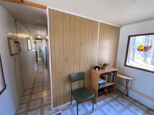 W8108 Vernon Ave, Chicog Twp, WI 54888 - living area featuring light floors and wood walls