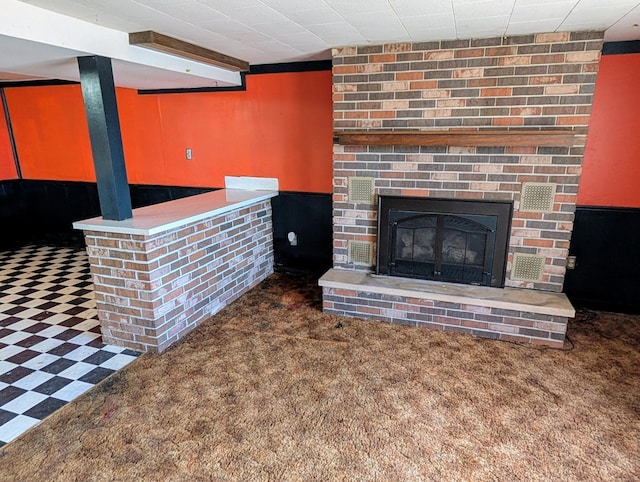 1433 Ridgeview Dr, Montevideo, MN 56265 - unfurnished living room with a brick fireplace, a bar, and carpet floors
